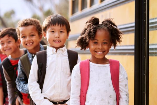 Children waiting at bus