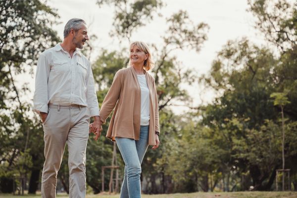 a couple going for a walk outside 