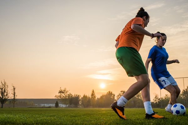 girls playing soccer