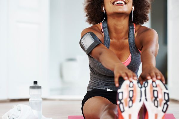 woman stretching before a run