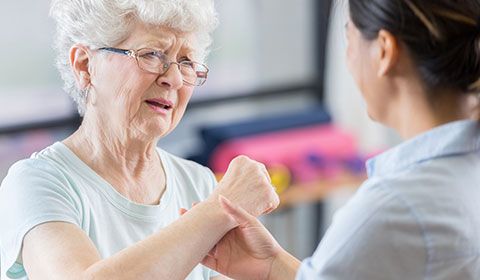 Patient and Physiotherapist working on muscle movement