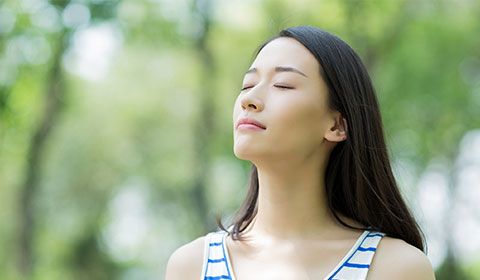 woman breathing easily